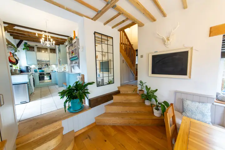 Steps up from the dining room to the kitchen