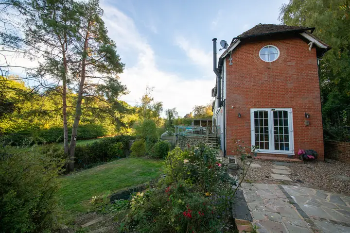 Rear of the cottage, garden doors and terrace